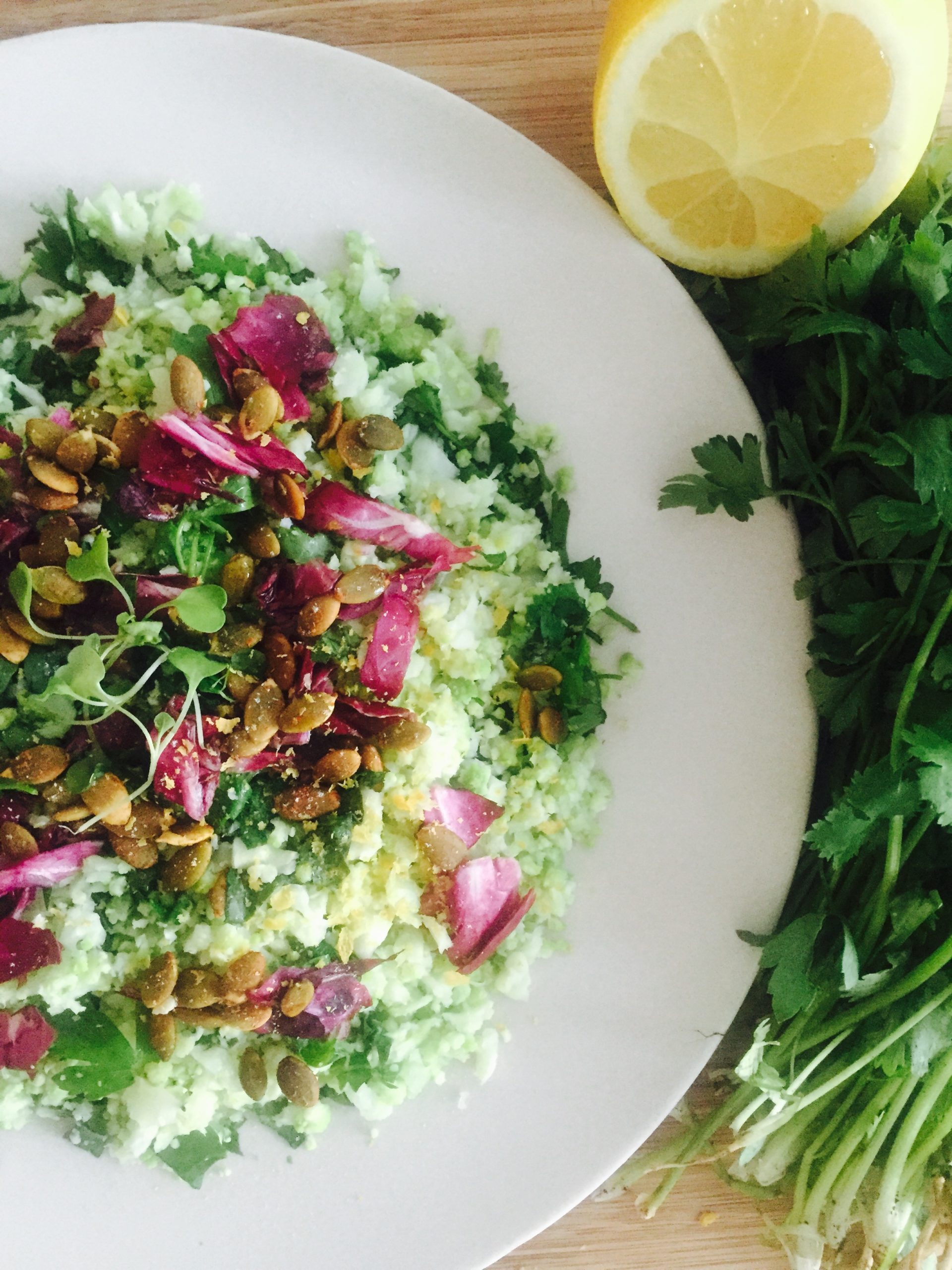 Warm Cauliflower ‘Couscous’ with Herbs and Kale Embody Wellness Co.